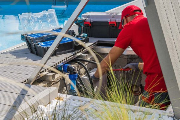 technician-fixing-swimming-pool-heating-system-resize.jpg